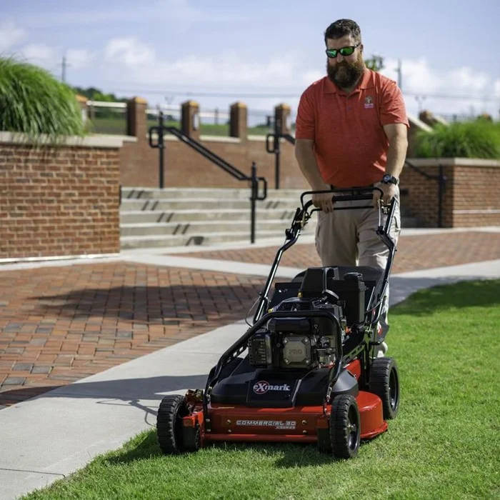 Exmark Commercial 30 X Series Walk Behind Lawn Mower Ecx200Ckc30000 Mower On Grass.Jpg product image